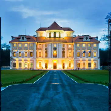 A large building with lights on the front of it.