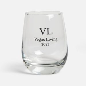 A glass with the name of vegas living on it.