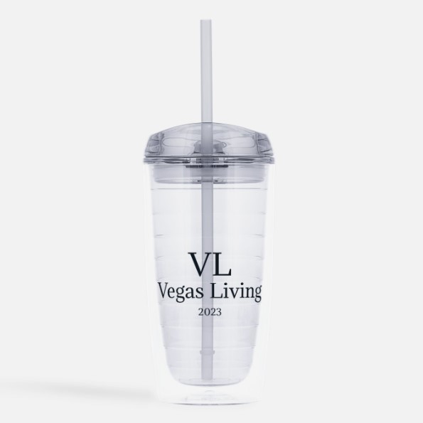 A clear cup with the name " vegas living 2 0 1 5 ".