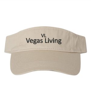 A visor that says " vegas living ".